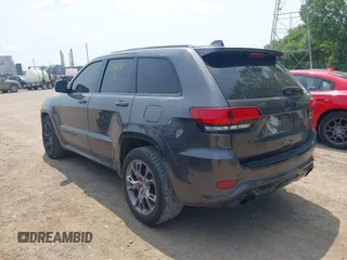 2018 Jeep Grand Cherokee SRT z VIN 1C4RJFDJ7JC281644, wystawiony jako IAAI lot #42481239 z przebiegiem 160 218 mil mil oraz . Historia ofert i sprzedaży dostępna na DreamBid. Obrazek 3.