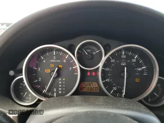 2008 Mazda MX-5 Miata Grand Touring z VIN JM1NC26F580144269, wystawiony jako Copart lot #56586405 z przebiegiem 52 871 mil mil oraz Szkody całkowita. Historia ofert i sprzedaży dostępna na DreamBid. Obrazek 9.