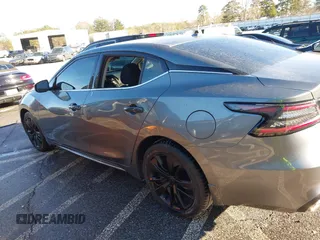 2020 Nissan Maxima S with VIN 1N4AA6BV7LC381254, listed as a IAAI auction lot 41246789 with 73,562 mi miles and . Bid and sale history available at DreamBid. Image 6.