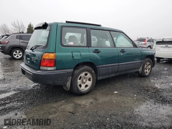 1999 Subaru Forester L with VIN JF1SF6356XH732233, listed as a Copart auction lot 87039714 with 170,275 mi miles and Salvage Title. Bid and sale history available at carsss.com. Image 3.