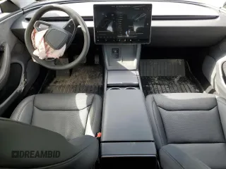 2025 Tesla Model 3 Long Range with VIN 5YJ3E1EB6SF921092, listed as a Copart auction lot 46918025 with 1,403 mi miles and Salvage Title. Bid and sale history available at DreamBid. Image 8.