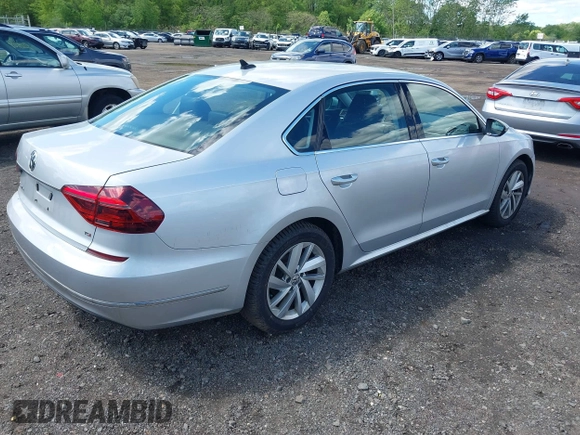 2018 Volkswagen Passat SE z VIN 1VWBA7A38JC004818, wystawiony jako IAAI lot #42205205 z przebiegiem 105 559 mil mil oraz . Historia ofert i sprzedaży dostępna na DreamBid. Obrazek 4.