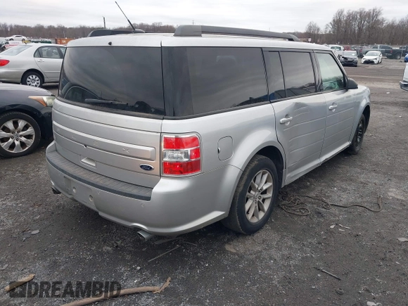 2016 Ford Flex SE with VIN 2FMGK5B80GBA12646, listed as a IAAI auction lot 41141786 with 100,000 mi miles. Bid and sale history available at carsss.com. Image 4.