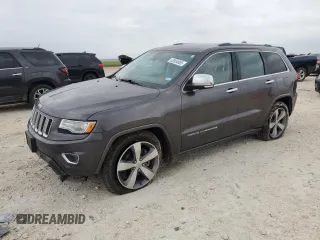 2014 Jeep Grand Cherokee Overland with VIN 1C4RJFCG9EC572237, listed as a Copart auction lot 53864865 with 90,657 mi miles and Salvage Title. Bid and sale history available at DreamBid. Image 1.
