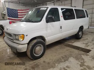 1999 Ford Econoline Passenger XL with VIN 1FBSS31L6XHA03014, listed as a Copart auction lot 88912295 with 107,472 mi miles and Salvage Title. Bid and sale history available at DreamBid. Image 1.