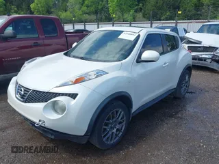 2013 Nissan Juke S with VIN JN8AF5MR4DT210456, listed as a IAAI auction lot 42100893 with 200,380 mi miles. Bid and sale history available at carsss.com. Image 2.