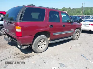 2002 Chevrolet Tahoe LT z VIN 1GNEC13Z72R276808, wystawiony jako IAAI lot #42133581 z przebiegiem 269 355 mil mil oraz . Historia ofert i sprzedaży dostępna na DreamBid. Obrazek 4.