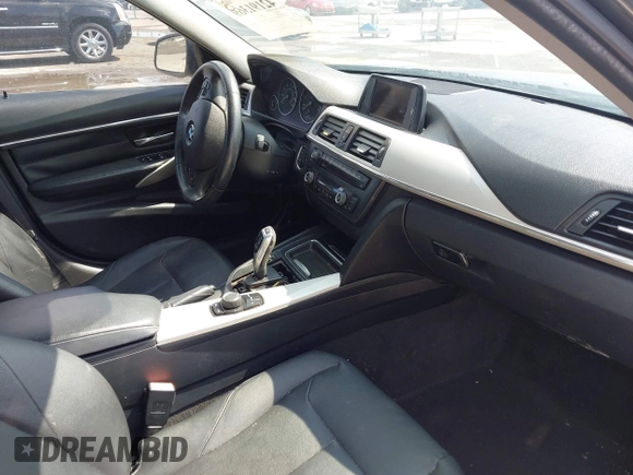 2013 BMW 3 Series 320i with VIN WBA3B1C5XDF462859, listed as a IAAI auction lot 42191369 with 140,253 mi miles and . Bid and sale history available at carsss.com. Image 5.