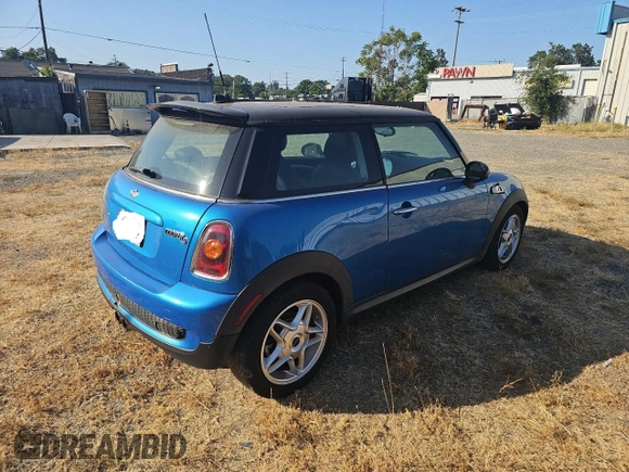 2009 MINI Hardtop S with VIN WMWMF73519TW86705, listed as a Copart auction lot 59819515 with 80,443 mi miles and Clean title. Bid and sale history available at DreamBid. Image 4.