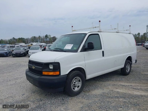 2017 Chevrolet Express Cargo Van with VIN 1GCWGAFFXH1184277, listed as a IAAI auction lot 41879743 with 117,989 mi miles. Bid and sale history available at carsss.com. Image 2.