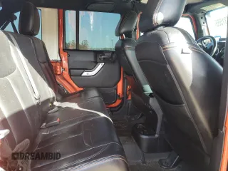 2015 Jeep Wrangler Unlimited Rubicon Hard Rock z VIN 1C4HJWFG7FL690098, wystawiony jako Copart lot #47431555 z przebiegiem 95 138 mil mil oraz Szkoda całkowita • Salvage title. Historia ofert i sprzedaży dostępna na DreamBid. Obrazek 11.