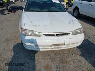 2000 Toyota Corolla VE с VIN 1NXBR12EXYZ404890, выставлен на аукционе IAAI как лот 42562778 с пробегом 190 132 миль миль и . История ставок и продаж доступна на DreamBid. Изображение 6.
