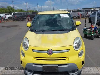2014 FIAT 500L Trekking with VIN ZFBCFADH7EZ020527, listed as a IAAI auction lot 42193698 with 21,771 mi miles and . Bid and sale history available at DreamBid. Image 6.
