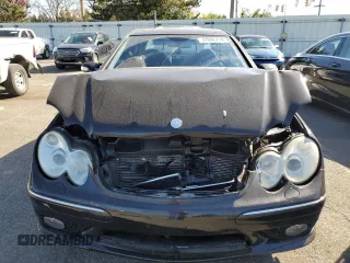 2003 Mercedes-Benz CLK 500 with VIN WDBTJ75JX3F039229, listed as a Copart auction lot 77006714 with 111,617 mi miles and Salvage Title. Bid and sale history available at DreamBid. Image 5.