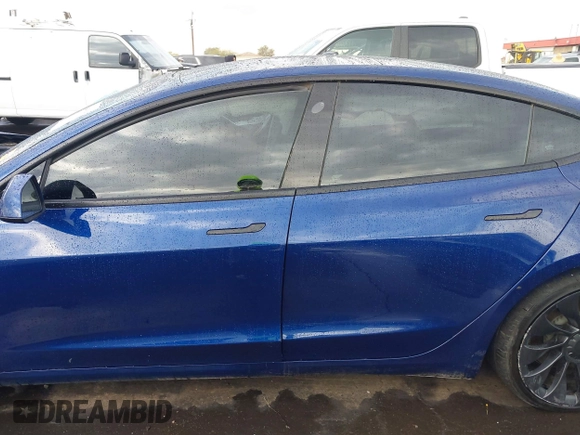 2022 Tesla Model 3 Performance with VIN 5YJ3E1EC7NF306192, listed as a IAAI auction lot 41453931 with 36,450 mi miles. Bid and sale history available at carsss.com. Image 13.