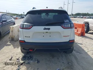 2019 Jeep Cherokee Trailhawk Elite with VIN 1C4PJMBN3KD487461, listed as a IAAI auction lot 41869751 with 91,197 mi miles and . Bid and sale history available at DreamBid. Image 17.