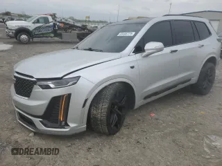 2020 Cadillac XT6 FWD Premium Luxury with VIN 1GYKPCRS8LZ112792, listed as a Copart auction lot 55496725 with 53,571 mi miles and Salvage title. Bid and sale history available at DreamBid. Image 1.