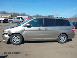 2006 Honda Odyssey EX-L z VIN 5FNRL38736B069969, wystawiony jako IAAI lot #41695311 z przebiegiem 196 218 mil mil oraz . Historia ofert i sprzedaży dostępna na DreamBid. Obrazek 14.
