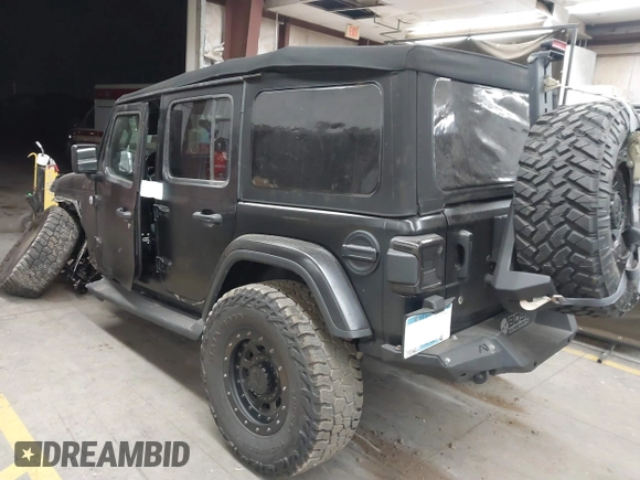 2018 Jeep Wrangler Unlimited Sahara z VIN 1C4HJXEN6JW294774, wystawiony jako IAAI lot #41573606 z przebiegiem 49 325 mil mil oraz . Historia ofert i sprzedaży dostępna na DreamBid. Obrazek 3.