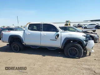2020 Toyota Tacoma SR5 with VIN 3TMCZ5ANXLM297886, listed as a IAAI auction lot 41965591 with Not provided miles and . Bid and sale history available at DreamBid. Image 12.