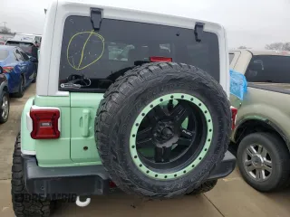 2018 Jeep Wrangler Unlimited Sahara z VIN 1C4HJXEN2JW211387, wystawiony jako Copart lot #42776935 z przebiegiem 66 170 mil mil oraz Szkoda całkowita • Salvage title. Historia ofert i sprzedaży dostępna na DreamBid. Obrazek 6.