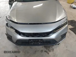 2023 Honda Civic Sport with VIN 19XFL2H80PE010679, listed as a IAAI auction lot 42026973 with 25,701 mi miles and . Bid and sale history available at DreamBid. Image 12.