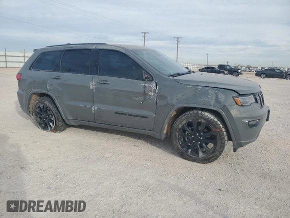 2020 Jeep Grand Cherokee Altitude with VIN 1C4RJFAG5LC105137, listed as a Copart auction lot 48630425 with 104,621 mi miles and Salvage Title. Bid and sale history available at carsss.com. Image 4.