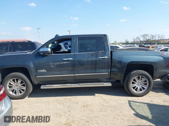 2018 Chevrolet Silverado 1500 High Country with VIN 3GCUKTEC8JG308353, listed as a IAAI auction lot 40714183 with 88,711 mi miles and . Bid and sale history available at DreamBid. Image 14.
