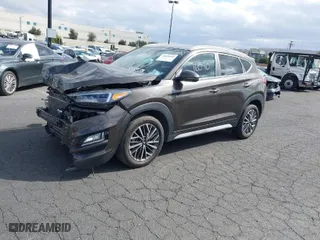 2020 Hyundai Tucson Sport with VIN KM8J33AL1LU128648, listed as a IAAI auction lot 41476040 with 66,526 mi miles. Bid and sale history available at carsss.com. Image 2.