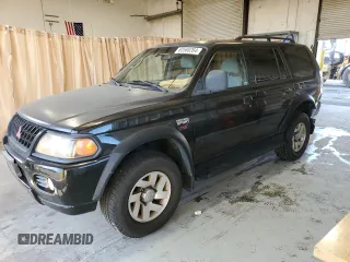 2001 Mitsubishi Montero z VIN JA4LS31R91P030736, wystawiony jako Copart lot #83586264 z przebiegiem 118 771 mil mil oraz Szkoda całkowita • Salvage title. Historia ofert i sprzedaży dostępna na DreamBid. Obrazek 1.
