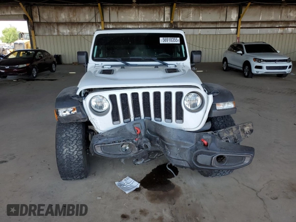 2021 Jeep Wrangler Unlimited Rubicon z VIN 1C4JJXFG5MW767036, wystawiony jako Copart lot #56918355 z przebiegiem 52 994 mil mil oraz Szkoda całkowita • Salvage title. Historia ofert i sprzedaży dostępna na DreamBid. Obrazek 5.