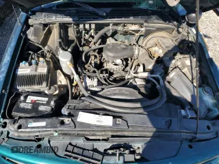 1997 GMC Jimmy SL with VIN 1GKCS13W2V2518446, listed as a Copart auction lot 86629634 with 183,089 mi miles and Salvage Title. Bid and sale history available at carsss.com. Image 12.