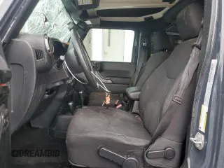 2017 Jeep Wrangler Unlimited Sport with VIN 1C4BJWDG6HL743322, listed as a Copart auction lot 61100045 with 135,959 mi miles and Salvage title. Bid and sale history available at DreamBid. Image 7.