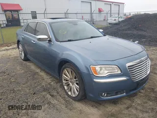 2011 Chrysler 300 with VIN 2C3CA6CT7BH580966, listed as a IAAI auction lot 41920247 with 167,991 mi miles. Bid and sale history available at carsss.com. Image 1.