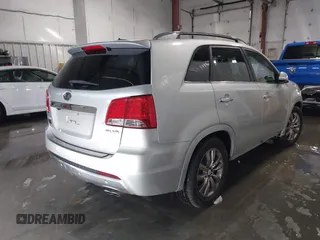 2013 Kia Sorento SX with VIN 5XYKWDA23DG375072, listed as a IAAI auction lot 41259538 with 147,871 mi miles. Bid and sale history available at carsss.com. Image 4.