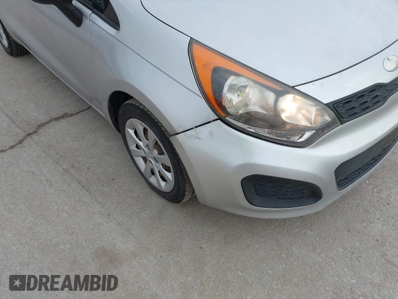 2013 Kia Rio LX with VIN KNADM5A30D6226681, listed as a IAAI auction lot 41657362 with 127,569 mi miles. Bid and sale history available at carsss.com. Image 6.