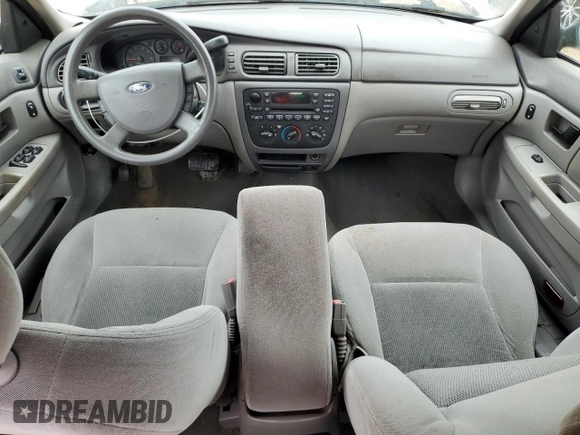 2007 Ford Taurus SE with VIN 1FAFP53U87A138588, listed as a Copart auction lot 56965245 with Not provided miles and Salvage title. Bid and sale history available at DreamBid. Image 8.