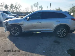 2017 Mazda CX-9 Grand Touring with VIN JM3TCADY5H0138176, listed as a IAAI auction lot 41458610 with 114,664 mi miles and . Bid and sale history available at DreamBid. Image 14.