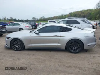 2015 Ford Mustang EcoBoost with VIN 1FA6P8TH9F5373917, listed as a IAAI auction lot 41932118 with 70,541 mi miles and . Bid and sale history available at carsss.com. Image 14.