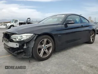 2014 BMW 4 Series 428i with VIN WBA3N7C55EF719986, listed as a Copart auction lot 56692685 with 74,377 mi miles and Salvage title. Bid and sale history available at DreamBid. Image 1.