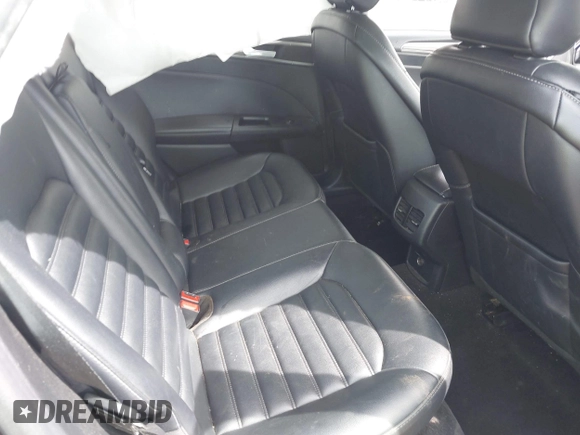 2019 Ford Fusion SEL with VIN 3FA6P0CD5KR182520, listed as a IAAI auction lot 42014190 with 107,028 mi miles and . Bid and sale history available at carsss.com. Image 8.