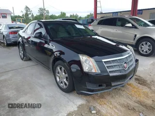 2009 Cadillac CTS RWD w/1SB with VIN 1G6DU57V290147277, listed as a IAAI auction lot 41995209 with 120,576 mi miles. Bid and sale history available at carsss.com. Image 1.