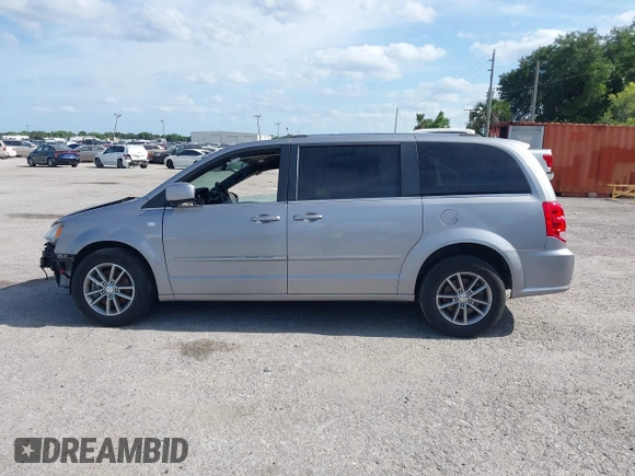 2014 Dodge Grand Caravan SXT with VIN 2C4RDGCG3ER193688, listed as a IAAI auction lot 41290544 with 73,092 mi miles and . Bid and sale history available at DreamBid. Image 15.