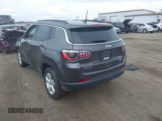 2021 Jeep Compass Latitude with VIN 3C4NJDBBXMT551702, listed as a IAAI auction lot 42045266 with 67,882 mi miles and . Bid and sale history available at DreamBid. Image 3.