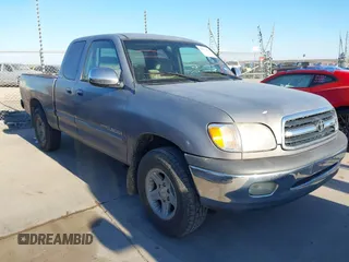 2000 Toyota Tundra SR5 with VIN 5TBRT3413YS019873, listed as a IAAI auction lot 41412497 with 305,472 mi miles and . Bid and sale history available at DreamBid. Image 1.