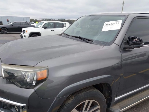 2014 Toyota 4Runner Limited with VIN JTEBU5JR0E5172302, listed as a IAAI auction lot 39452939 with 105,782 mi miles. Bid and sale history available at carsss.com. Image 17.