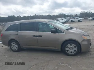2012 Honda Odyssey LX z VIN 5FNRL5H25CB019912, wystawiony jako IAAI lot #41458224 z przebiegiem 158 980 mil mil oraz . Historia ofert i sprzedaży dostępna na DreamBid. Obrazek 14.