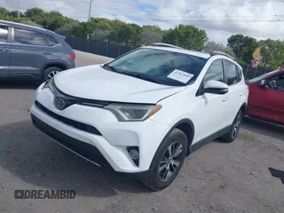 2018 Toyota RAV4 XLE with VIN JTMWFREV7JJ731893, listed as a IAAI auction lot 41567850 with 141,269 mi miles. Bid and sale history available at carsss.com. Image 2.