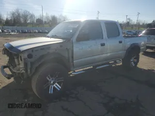 2002 Toyota Tacoma PreRunner with VIN 5TEGN92N72Z001520, listed as a Copart auction lot 47219385 with 239,232 mi miles and Salvage Title. Bid and sale history available at DreamBid. Image 1.