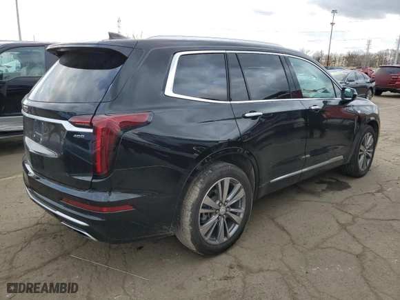 2021 Cadillac XT6 Premium Luxury with VIN 1GYKPDRSXMZ179742, listed as a Copart auction lot 79511814 with 33,895 mi miles and Salvage Title. Bid and sale history available at carsss.com. Image 3.